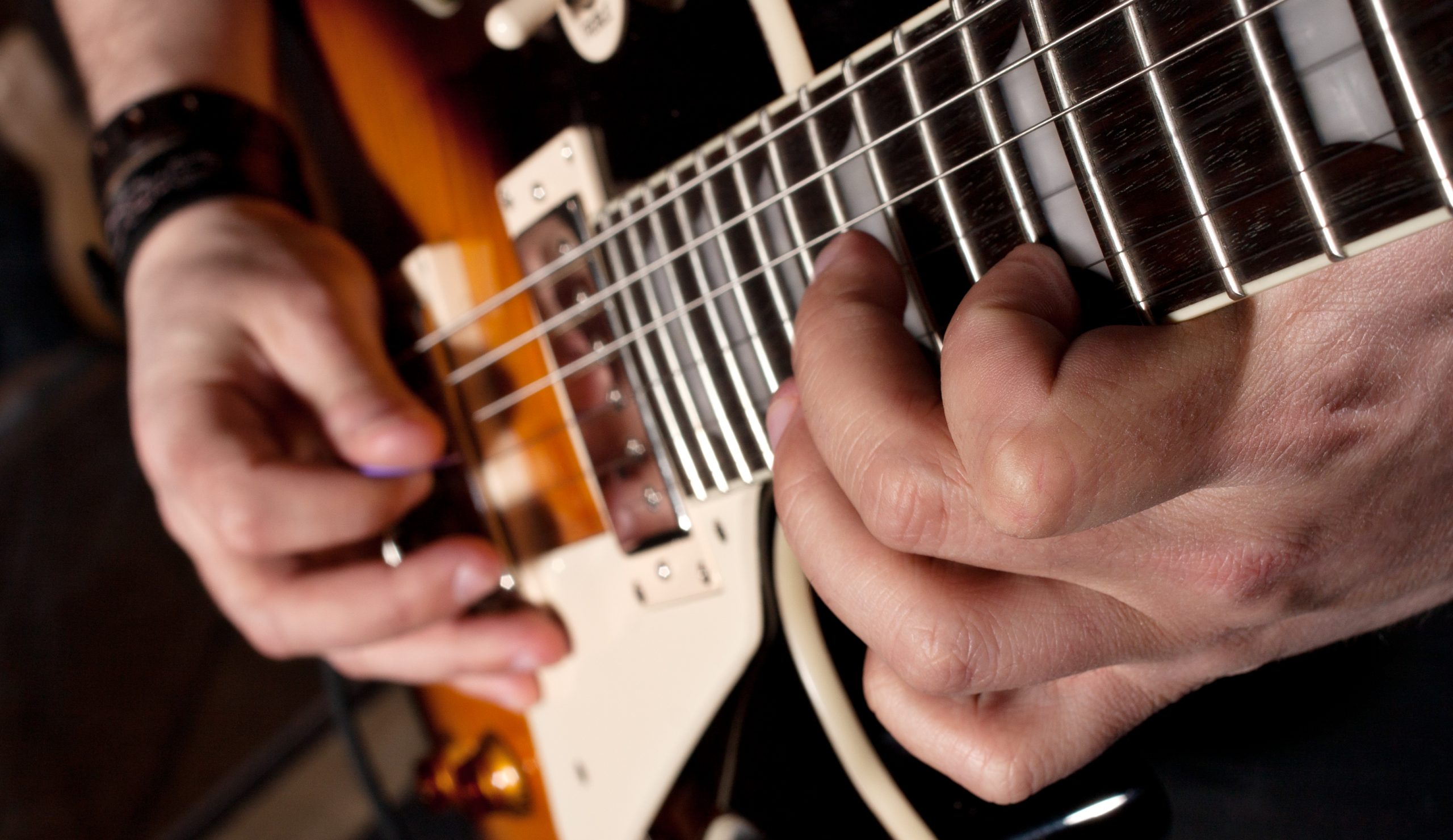 Why Do Guitarists Tape Their Fingers? We Know the Answer!