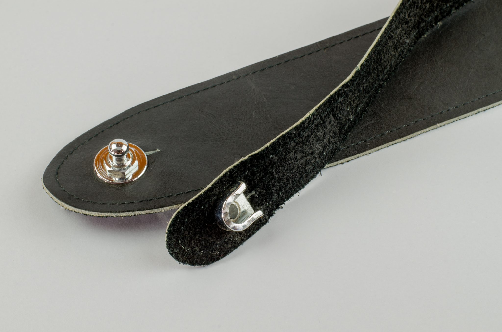 How to Put a Guitar Strap on an Acoustic Guitar Securely