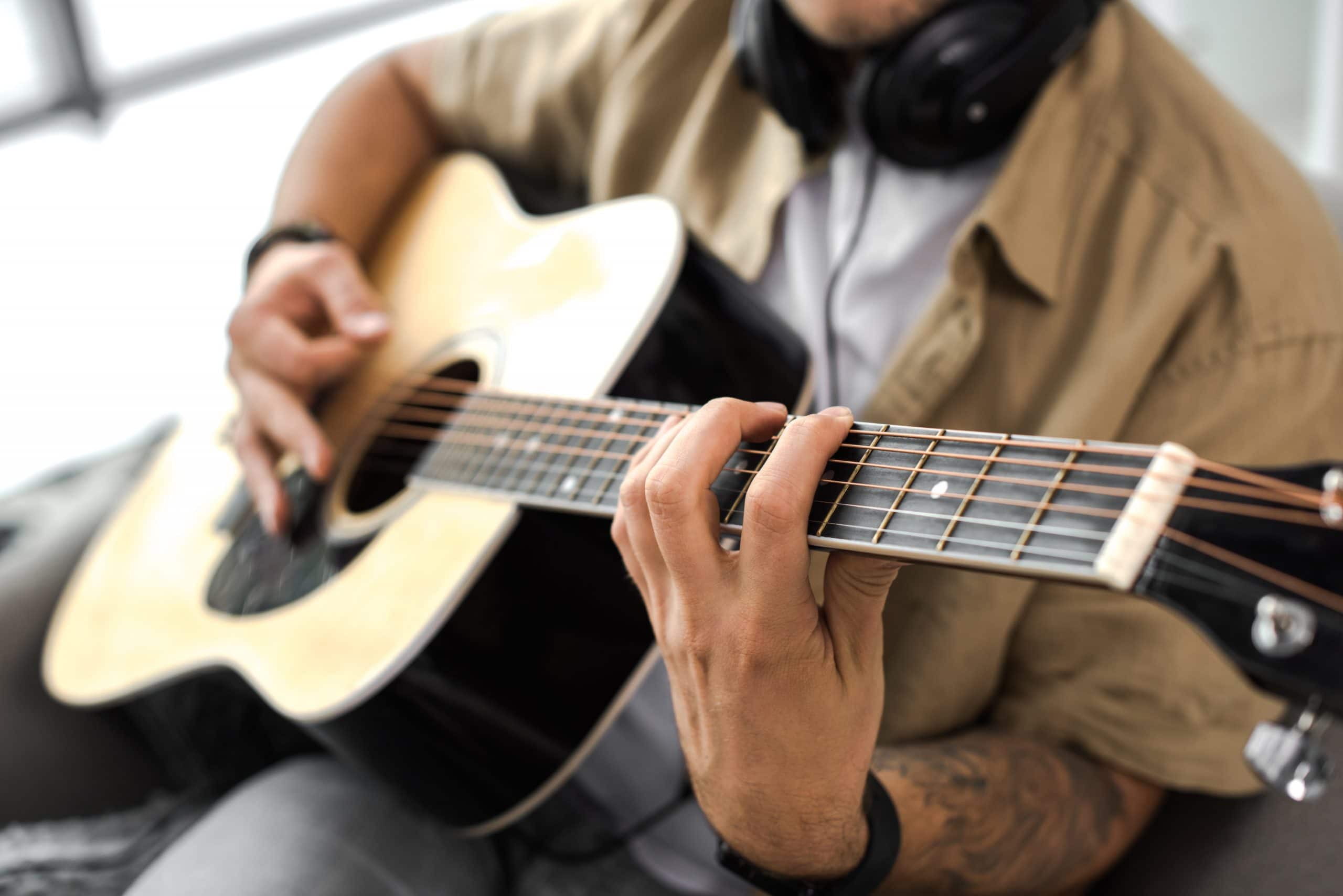 man playing guitar